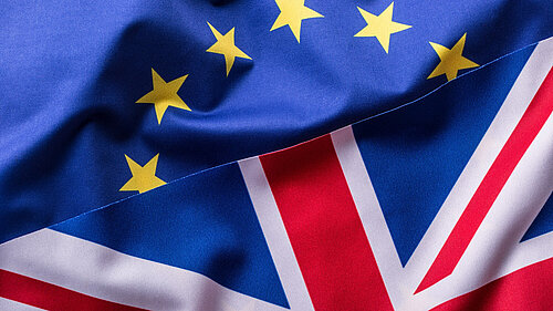 A flag consisting of half of the union jack and half of the EU flag.